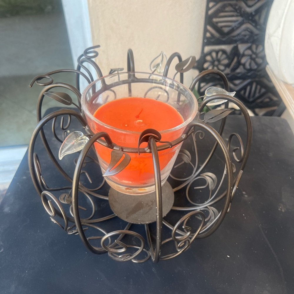 Elegant Black Metal Pumpkin Candle Holder with Orange Candle